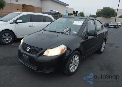 2011 Suzuki Sx4 Le z USA, uszkodzony, nr VIN JS2YC5A28B6301189